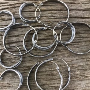 Hoop earrings from cast okra, April Ottey